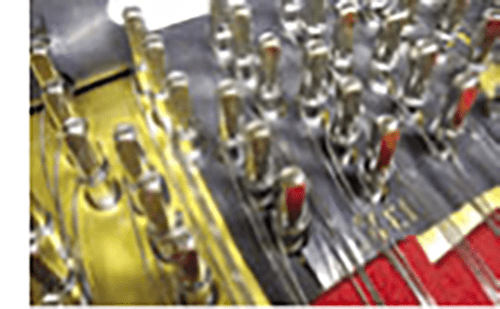 Plate protection around tuning pins during stringing