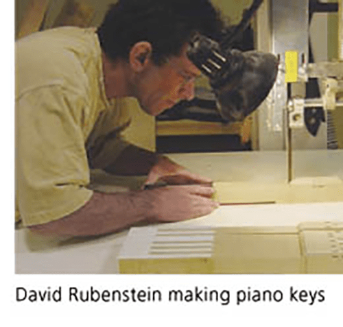 David Rubenstein making piano keys